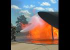 Firefighters from Joe Foss Field and South Dakota Air National Guard Crash Fire Rescue perform air rescue pit fire training. Joe Foss Field Station Captain Lonnie Albers celebrated his final pit fire training after 39 years of fire service as an Air Force, National Guard, career, and volunteer firefighter.	