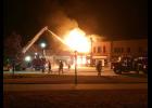 Firefighters from Eldora, Steamboat Rock and Union battled a fire on the downtown square in Eldora on March 9. The cause of the fire at the vacant former YMCA building was being investigated by the State Fire Marshal’s Office. Firefighters were able to keep the fire from spreading to adjacent buildings, which suffered smoke and water damage. Photo by Aaron Budweg.