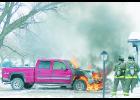 Albion Fire Department responded to a vehicle fire on Jan. 21 in Albion. The fire started in the engine compartment and was apparently caused by an electrical malfunction. Fire Chief Bruce Benne said the fire was extinguished in about 15 minutes. Photo by Thomas Hosford of the Albion News.	