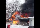 Arnold’s Park/Okoboji Fire and Rescue was dispatched to a house fire on March 3. When they arrived, the fire had spread to an adjacent home as well. Due to the extreme cold, assistance was called for prior to arrival from both the Milford Fire Department and the Spirit Lake Fire Department. One home was a total loss while damages to the other home were limited to an estimated $25,000. Photo by Jason Petersen.
