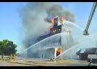  A 1948 structure at NEW Cooperative in Bode was burned in a training exercise on Saturday morning. A total of 60 firefighters from 14 fire departments took part in the exercise. See more photos inside this issue and at www.humboldtnews.com.      