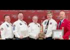 Presenting David with his retirement award and cer-tificates are L to R: Asst. Chief Dan Reisetter, RFD President Charlie Runge, IFA President/Chief Chuck Raska, David Raska and IFA PP Jason Barrick. 