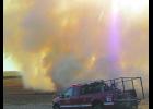 Denison and Dow City fire departments were called to field fire and combine fire on Oct. 15. Photo by Jim Clark.