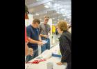 Kathy Horn, Auxiliary secretary, assists Fire School attendees with check in. Photo by Taylor Anderson.