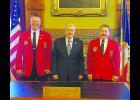 Bill Halleran (left), President of the Iowa Firefighters Association (IFA) and Marv Trimble (right), 1st vice-president of the IFA, met with Iowa Governor Terry Branstad on Oct. 14.