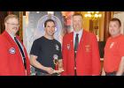 The Des Moines Fire Department won the chili cookoff contest held at the Iowa State Capitol on March 31. Pictured from left to right are: Al Esch, IFA President; Tanner Stone of the Des Moines Fire Department; Bill Halleran, IFA third vice-president; and John Jensen of the Des Moines Fire Department. Photo by Jack Runge.