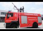Midland Fire Chief Reuben Vollmer visits with Peter Krings, firefighter/medic in Hilden, Germany.