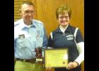 On Jan. 7, at the Papillion Volunteer Fire Department’s banquet and awards night, Marlene Bomar (right), first vice-president of the Nebraska State Volunteer Firefighters Association, presented Fredrick “Fritz” Weiss with his award for 50 years of service to his department and community from the NSVFA.