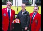 Brian Platz (center) retired from the Solon Fire Department with 20 years of service to take the Chief position in North Liberty. At left is IFA Past President Bill Halleran and at right is IFA President Marv Trimble.	