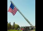 Flag flying from the Perham Fire Department Ladder Truck