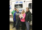 A baby was delivered in the ambulance on the way to the hospital on Feb. 21. Ironically, it was family members who assisted in the delivery. From left to right are: John and Dixie Falk, baby Brandon Gosmire, mother Sandy Falk and Kathy Styles. John, Dixie and Kathy are all members of the White Lake Ambulance Service. John, Sandy and Kathy are all siblings.